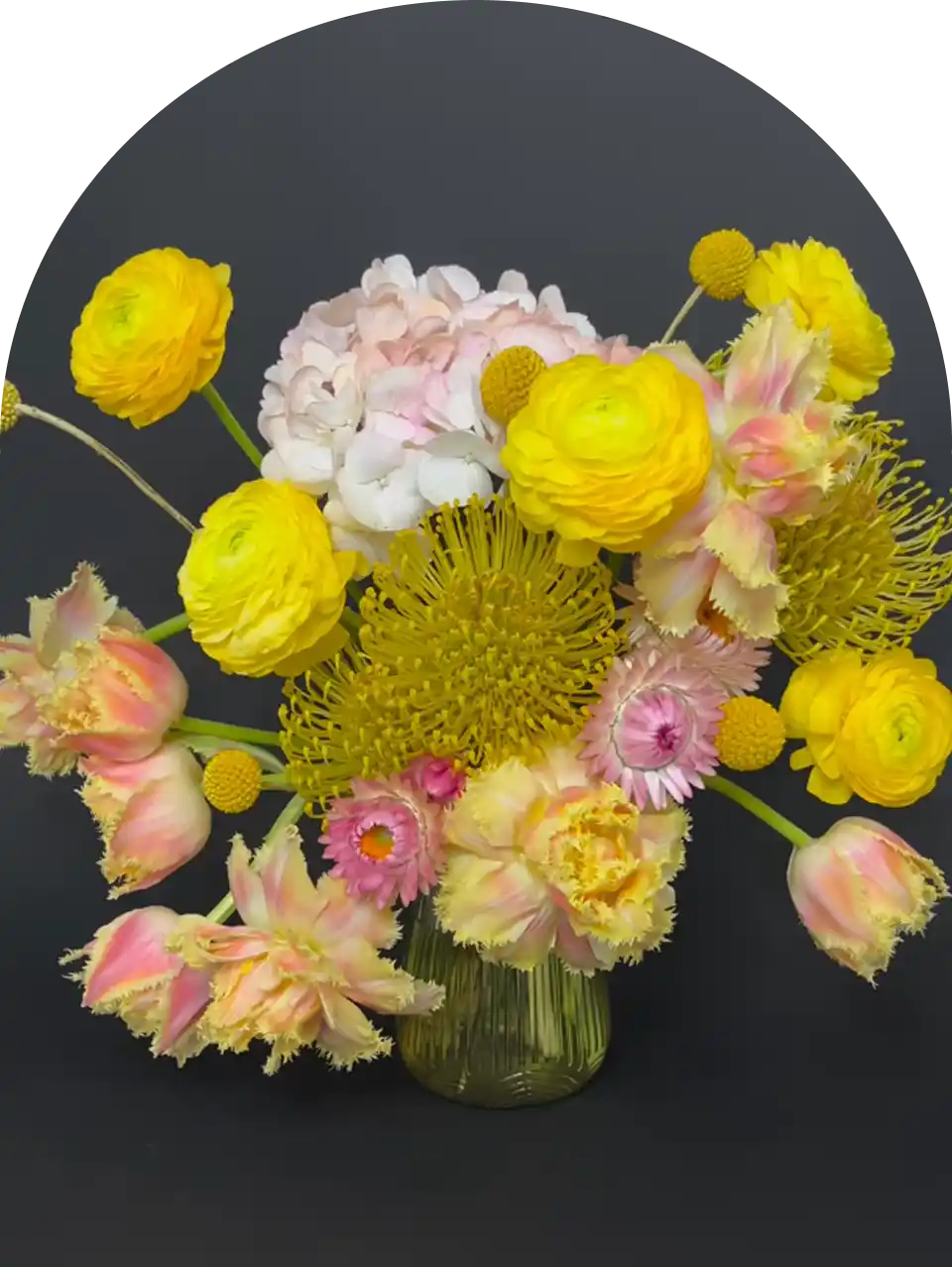 Floral arrangement showcasing intentional design with layered textures and natural forms