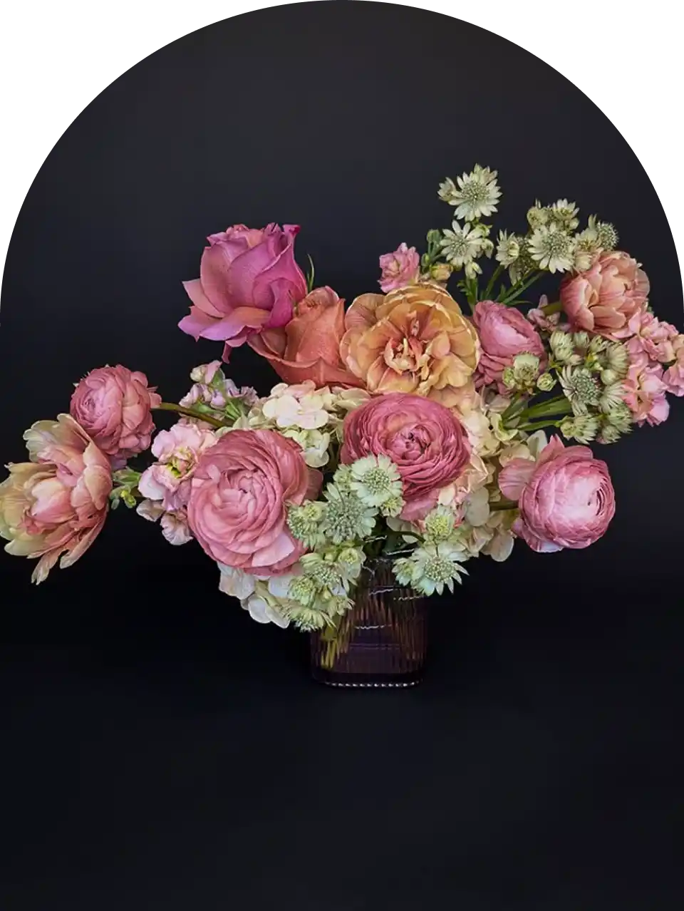 Floral arrangement in a natural, garden-inspired style, representing the story and inspiration behind Nola's Garden